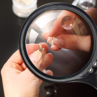 hand held magnifying glass with lights